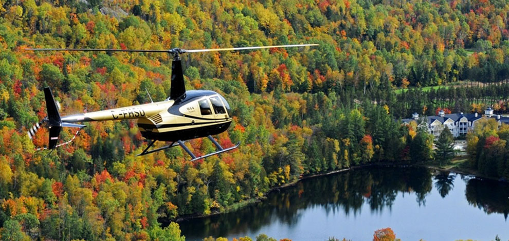Survolez le Mont-Tremblant ou les Laurentides à bord d’un hélicoptère avec Vol Récréatif.